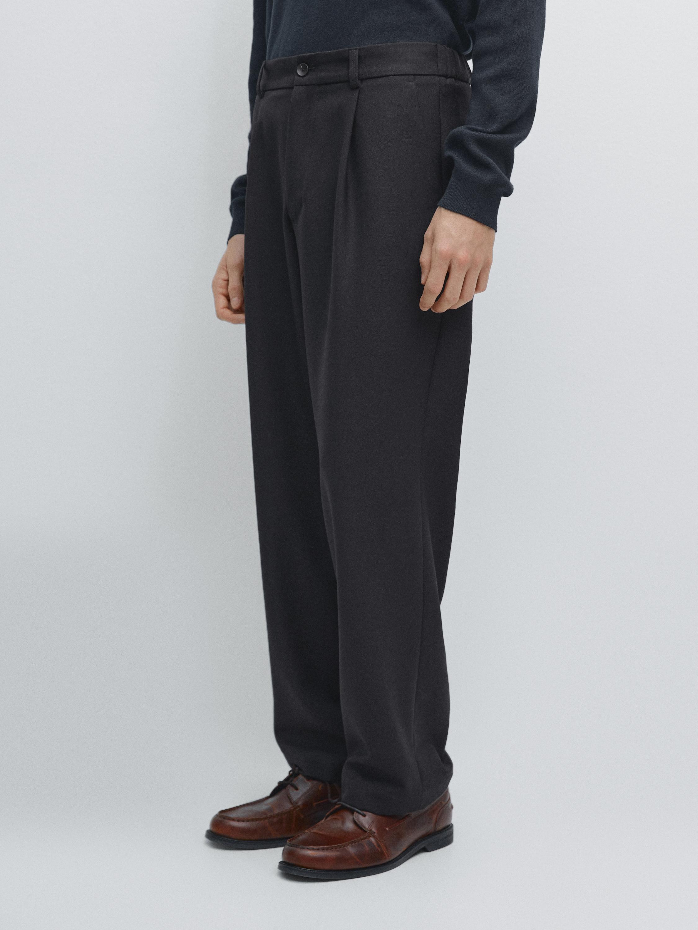 Relaxed fit darted wool blend trousers